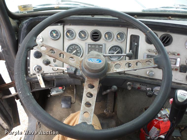 image for item DD9064 1987 Ford LTL9000 flatbed truck