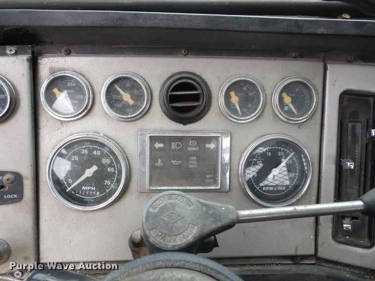 image for item DD9064 1987 Ford LTL9000 flatbed truck