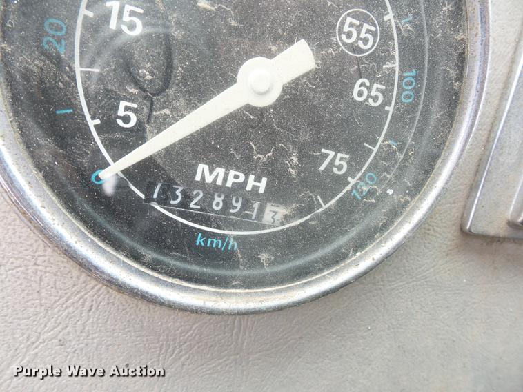 image for item DD9064 1987 Ford LTL9000 flatbed truck