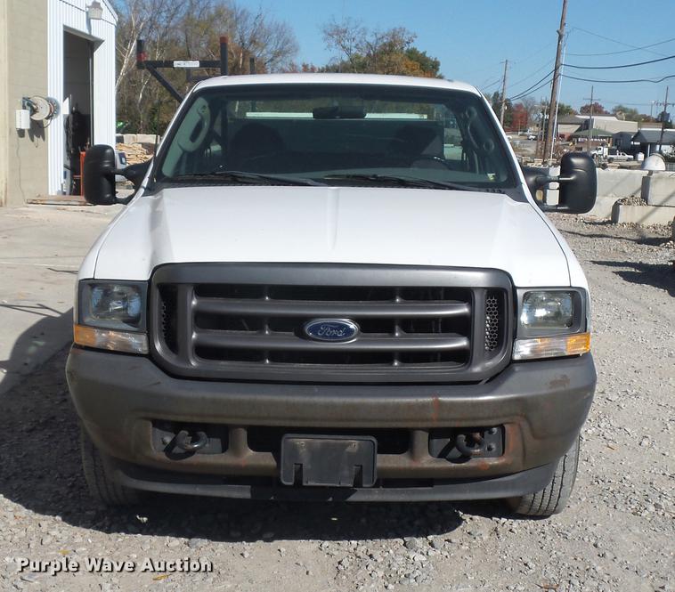 image for item DD9513 2003 Ford F250 Super Duty utility bed pickup truck