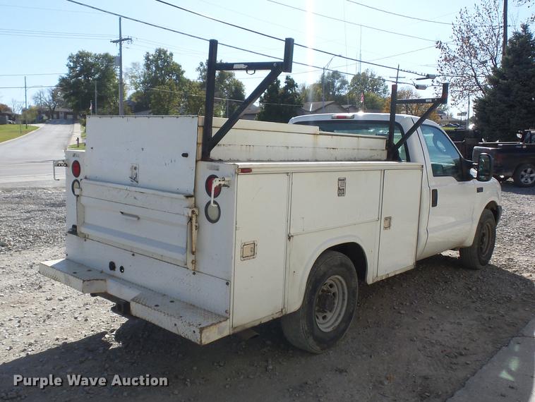 image for item DD9513 2003 Ford F250 Super Duty utility bed pickup truck