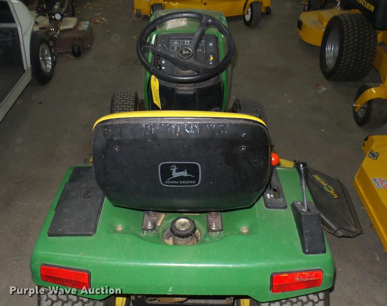 image for item ED9005 John Deere 320 lawn mower