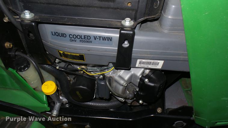 image for item ED9005 John Deere 320 lawn mower