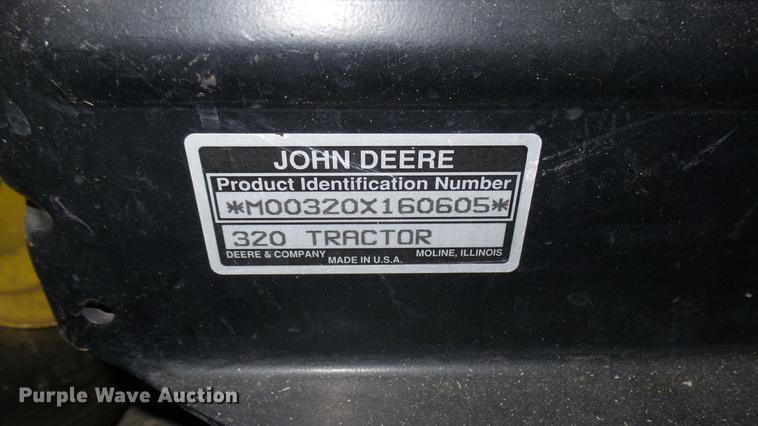 image for item ED9005 John Deere 320 lawn mower