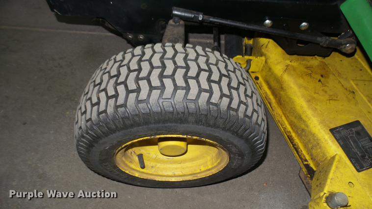 image for item ED9005 John Deere 320 lawn mower