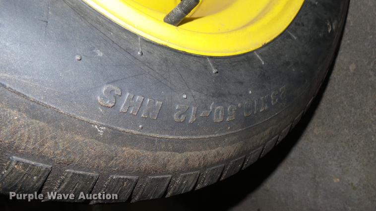 image for item ED9005 John Deere 320 lawn mower