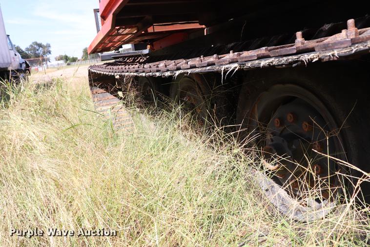 image for item ED9582 Nodwell FN110 track carrier with digger derrick