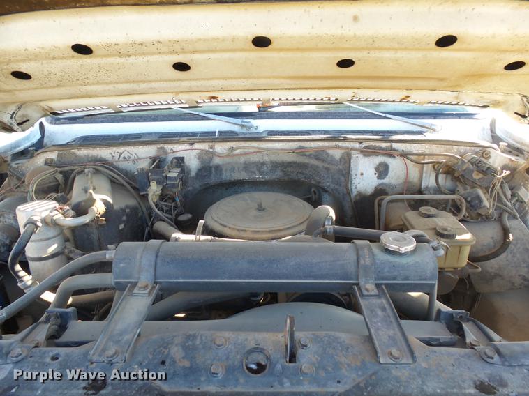 image for item J5420 1990 Chevrolet C60 flatbed truck