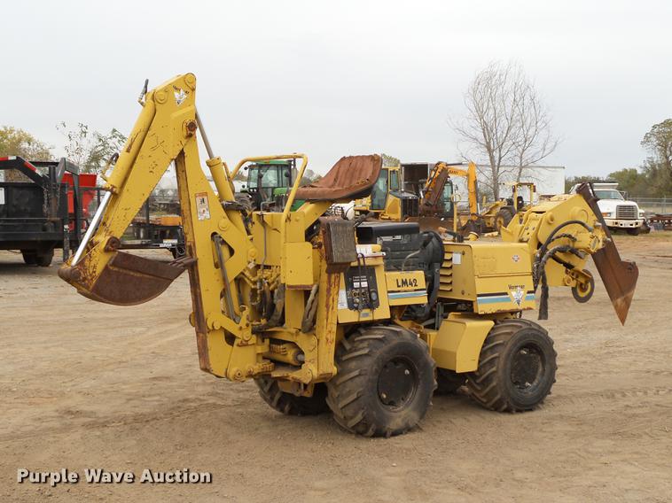 image for item DB4218 2000 Vermeer LM42 utility plow / backhoe