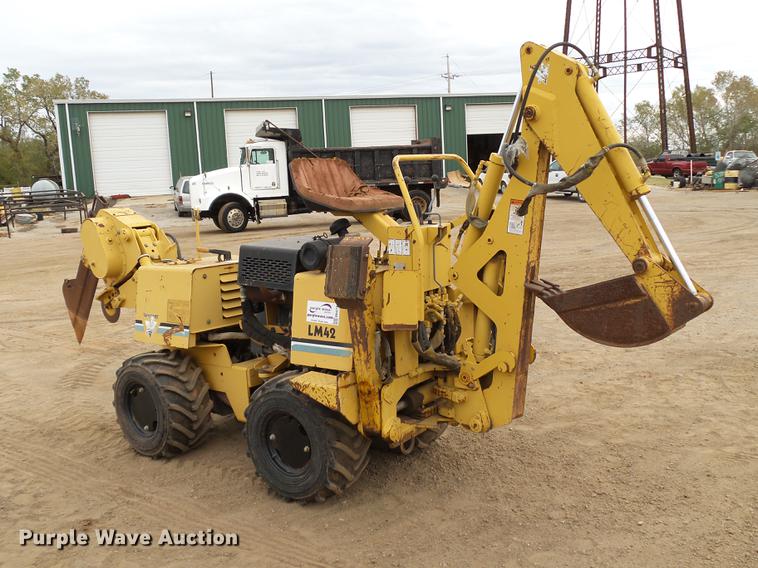 image for item DB4218 2000 Vermeer LM42 utility plow / backhoe
