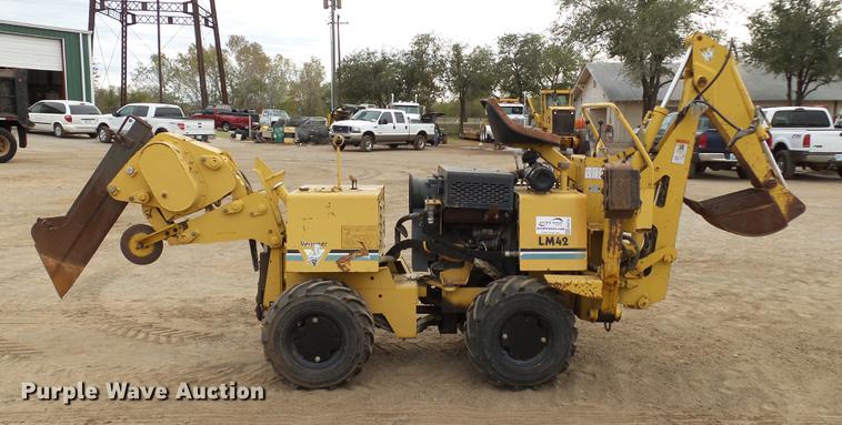 image for item DB4218 2000 Vermeer LM42 utility plow / backhoe
