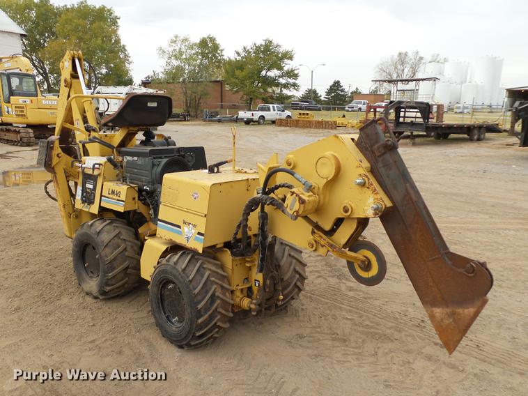 image for item DB4218 2000 Vermeer LM42 utility plow / backhoe