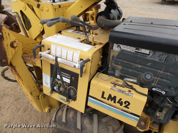 image for item DB4218 2000 Vermeer LM42 utility plow / backhoe