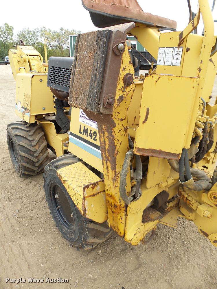 image for item DB4218 2000 Vermeer LM42 utility plow / backhoe