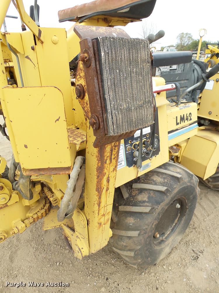 image for item DB4218 2000 Vermeer LM42 utility plow / backhoe