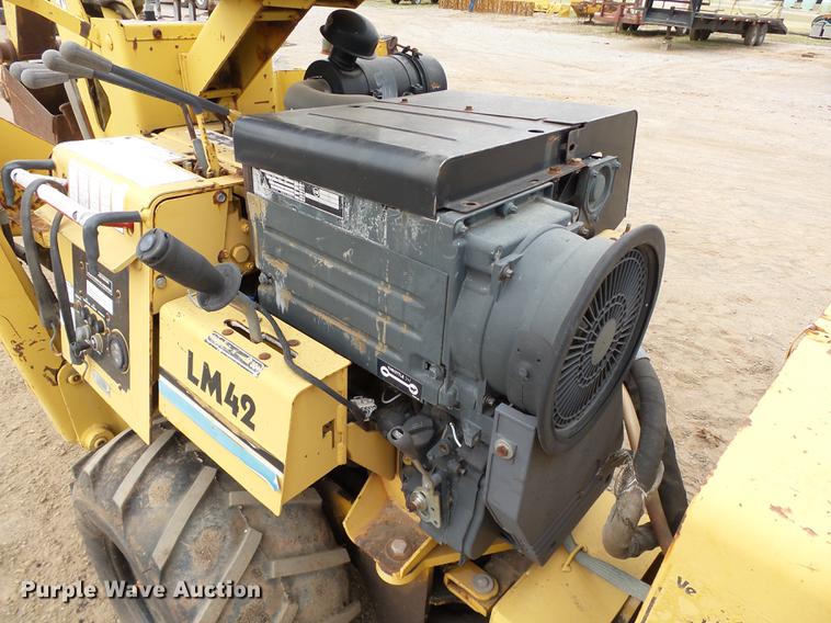 image for item DB4218 2000 Vermeer LM42 utility plow / backhoe