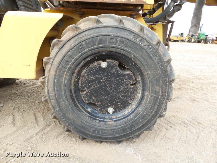 image for item DB4218 2000 Vermeer LM42 utility plow / backhoe