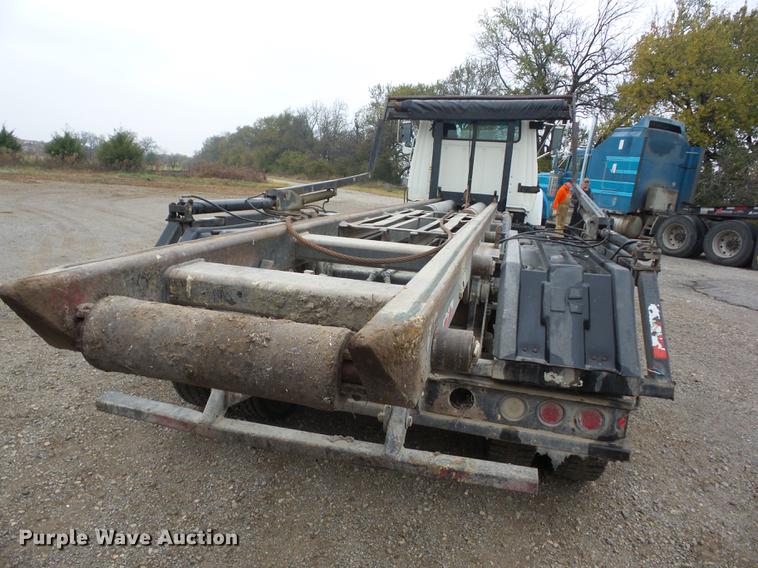 image for item K6330 1995 Ford LT8000 roll-off truck