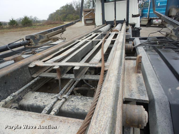 image for item K6330 1995 Ford LT8000 roll-off truck