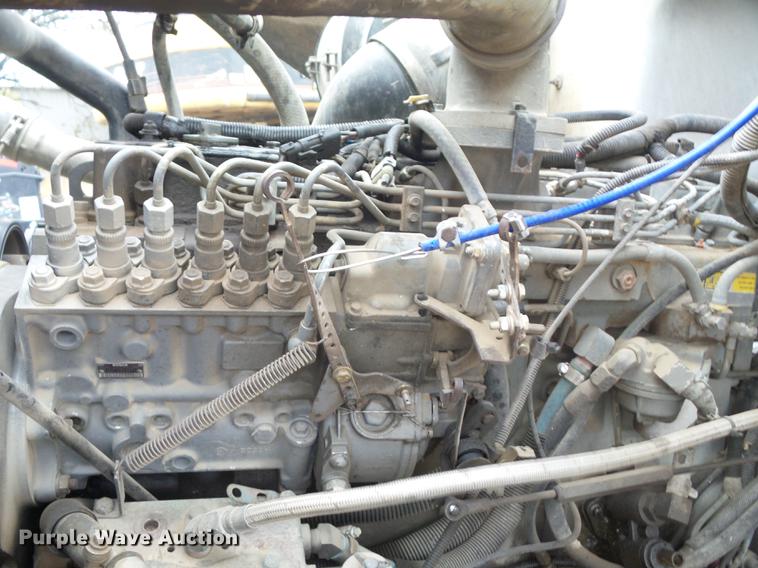 image for item K6330 1995 Ford LT8000 roll-off truck