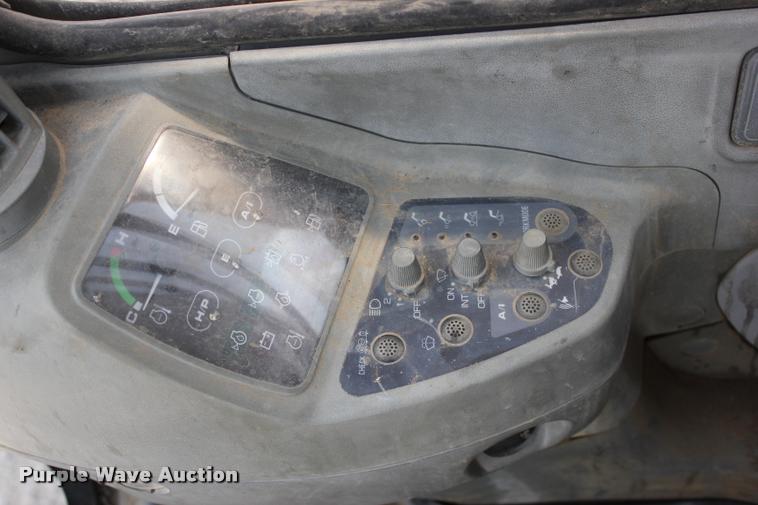 image for item L3207 2000 John Deere 120 excavator