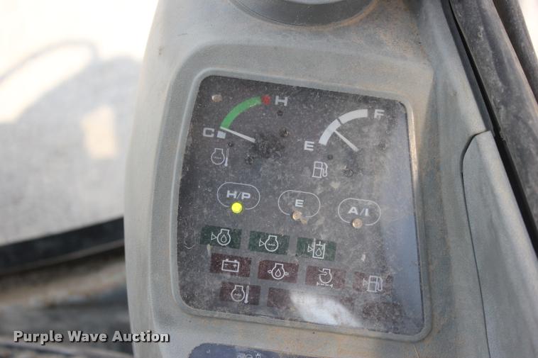 image for item L3207 2000 John Deere 120 excavator