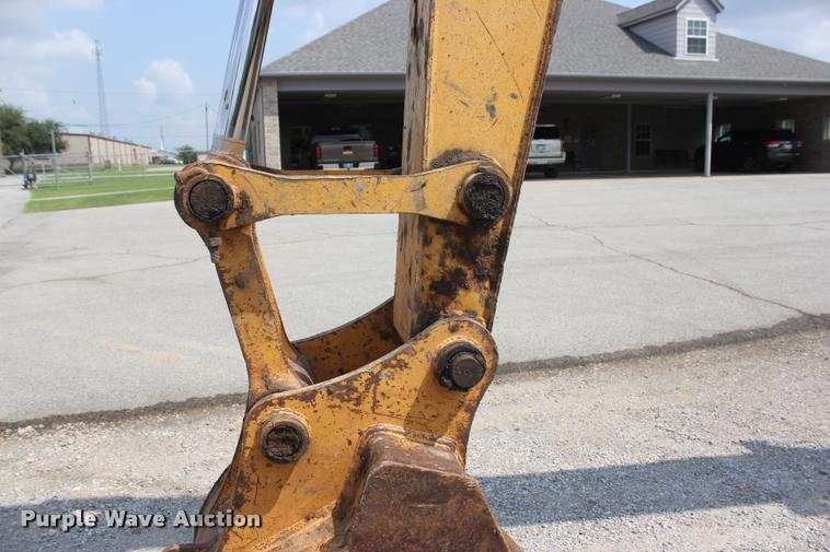 image for item L3207 2000 John Deere 120 excavator