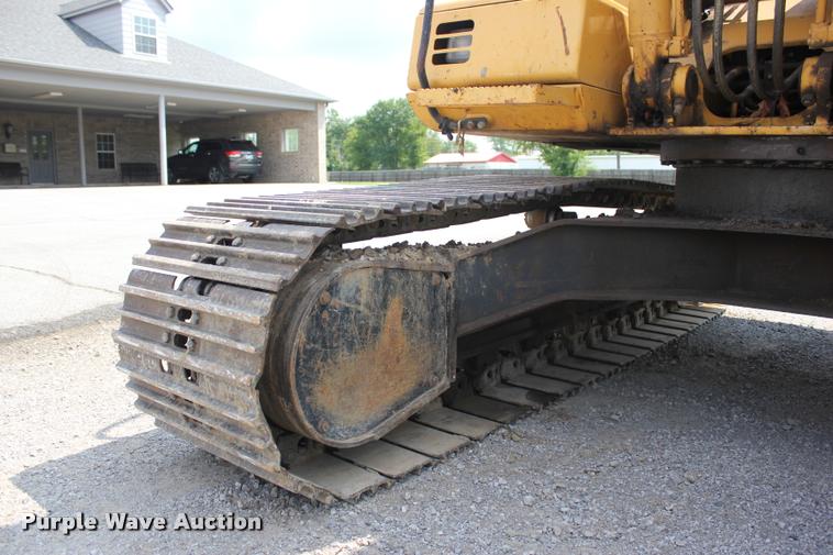 image for item L3207 2000 John Deere 120 excavator