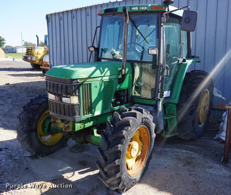 image for item DA1325 2000 John Deere 6310 MFWD tractor