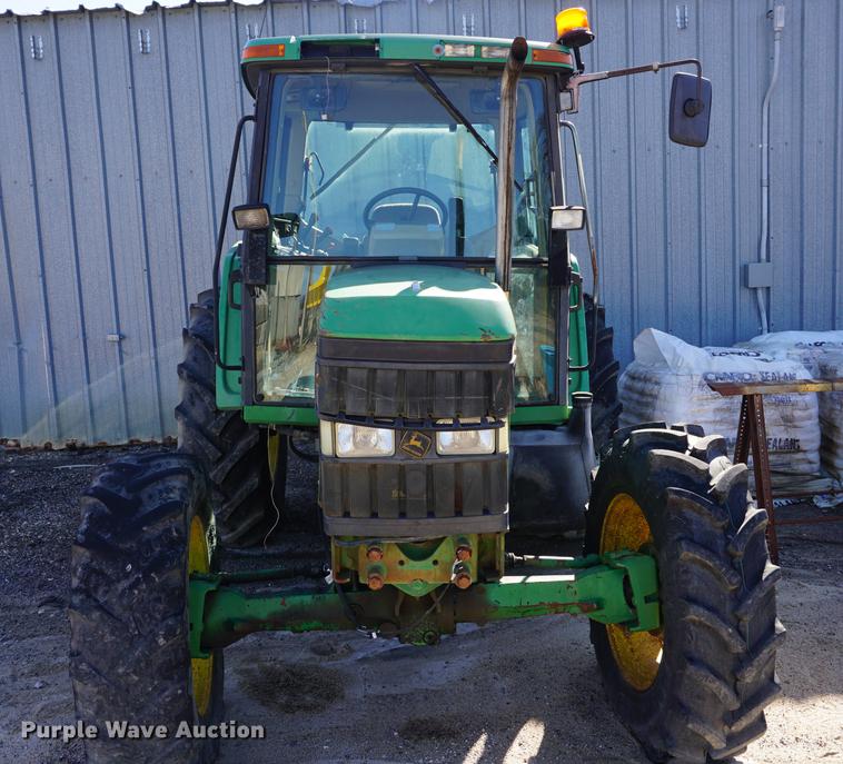 image for item DA1325 2000 John Deere 6310 MFWD tractor