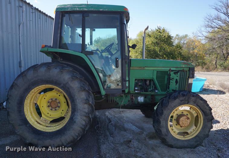 image for item DA1325 2000 John Deere 6310 MFWD tractor