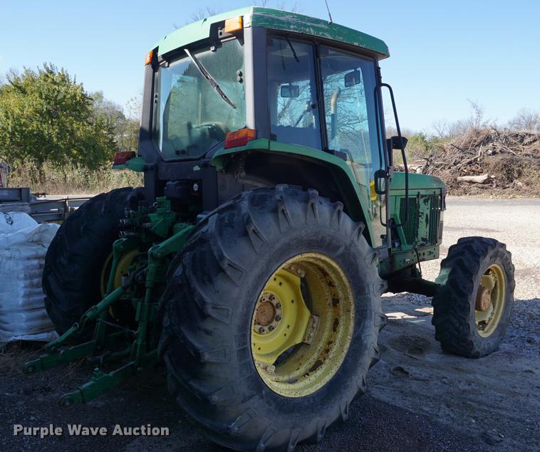 image for item DA1325 2000 John Deere 6310 MFWD tractor