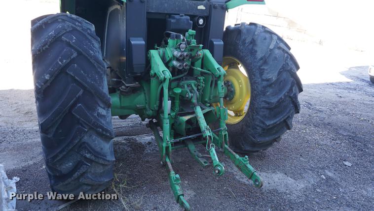 image for item DA1325 2000 John Deere 6310 MFWD tractor