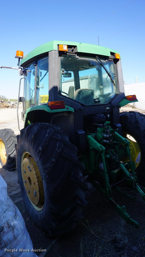 image for item DA1325 2000 John Deere 6310 MFWD tractor