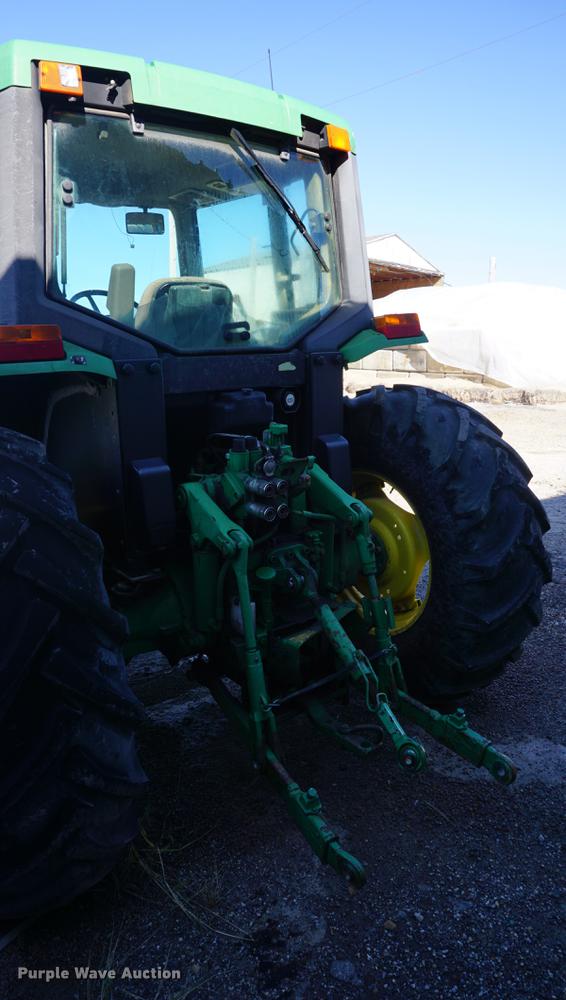 image for item DA1325 2000 John Deere 6310 MFWD tractor