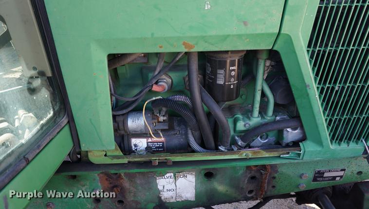 image for item DA1325 2000 John Deere 6310 MFWD tractor