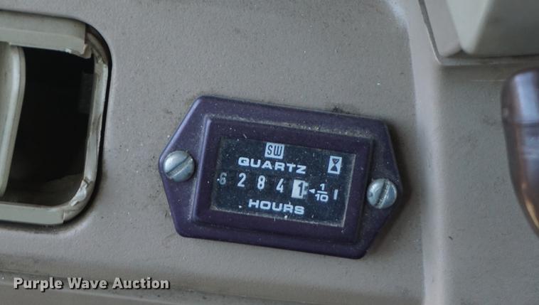 image for item DA1325 2000 John Deere 6310 MFWD tractor