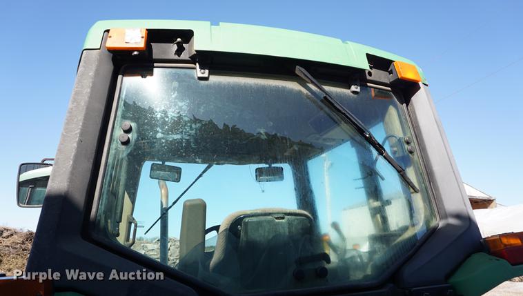 image for item DA1325 2000 John Deere 6310 MFWD tractor