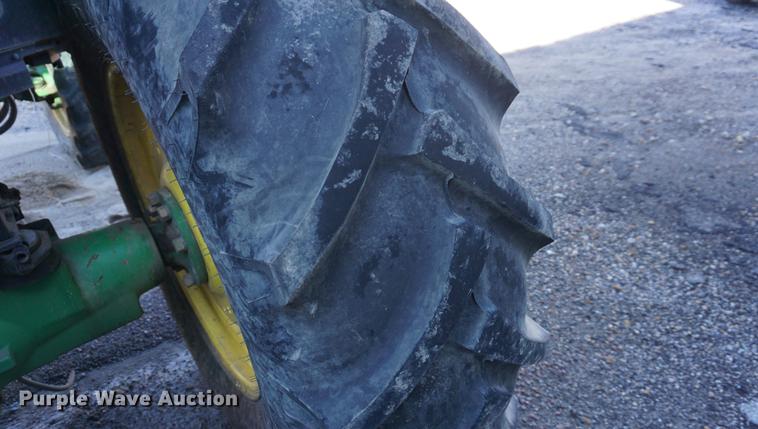 image for item DA1325 2000 John Deere 6310 MFWD tractor