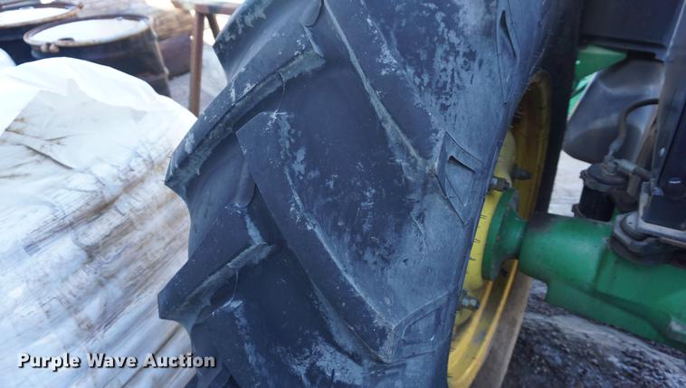 image for item DA1325 2000 John Deere 6310 MFWD tractor