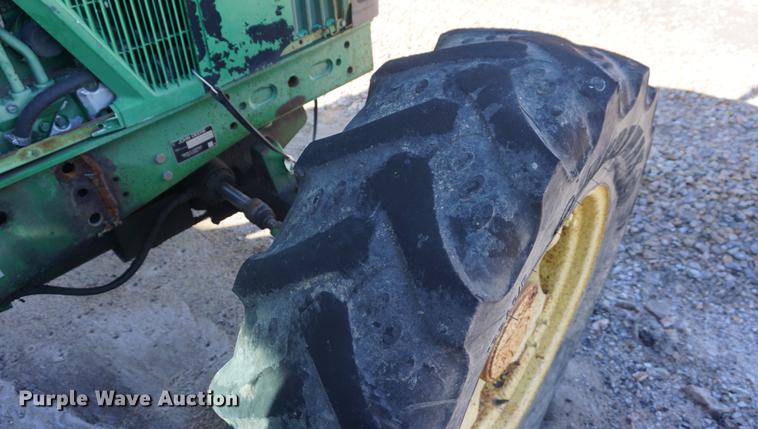 image for item DA1325 2000 John Deere 6310 MFWD tractor