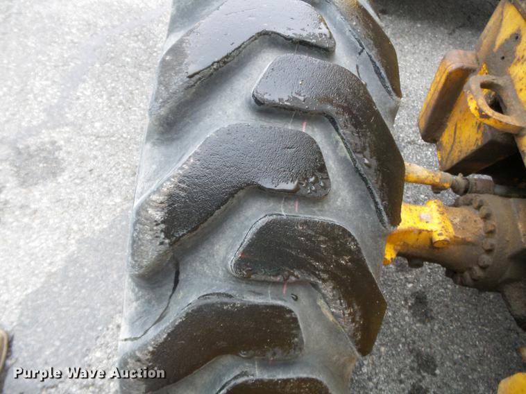 image for item DC6779 2001 John Deere 310SG backhoe