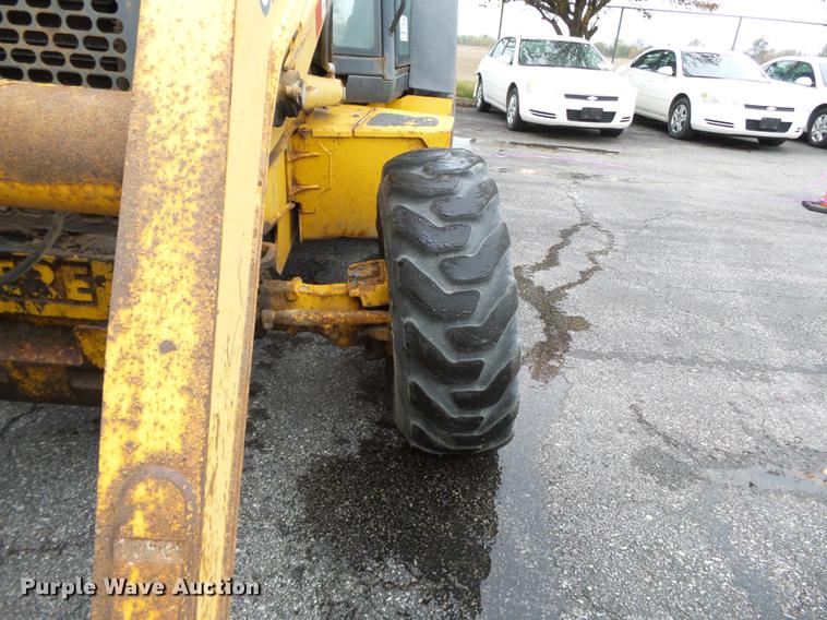 image for item DC6779 2001 John Deere 310SG backhoe