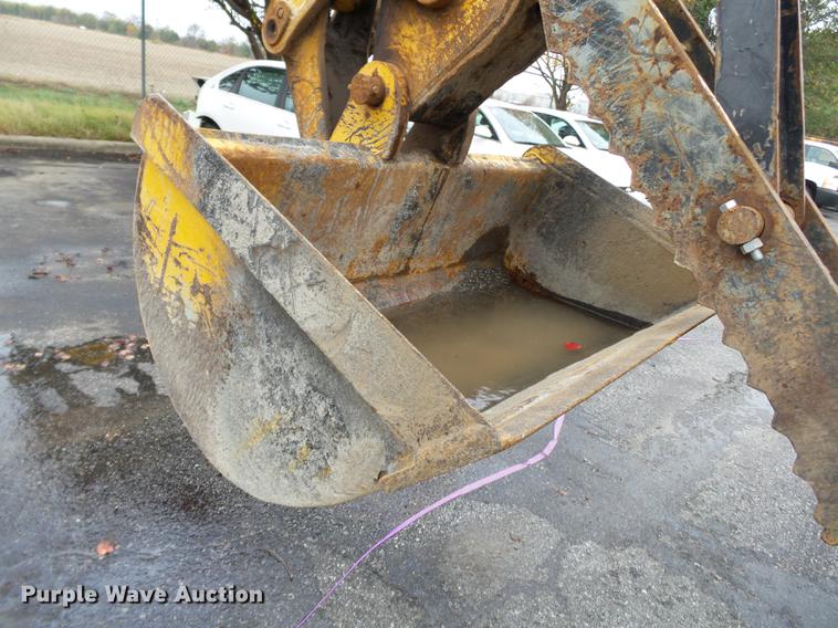 image for item DC6779 2001 John Deere 310SG backhoe