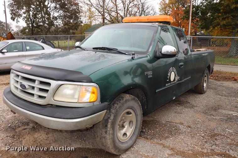 image for item ED9733 1999 Ford F150 SuperCab pickup truck