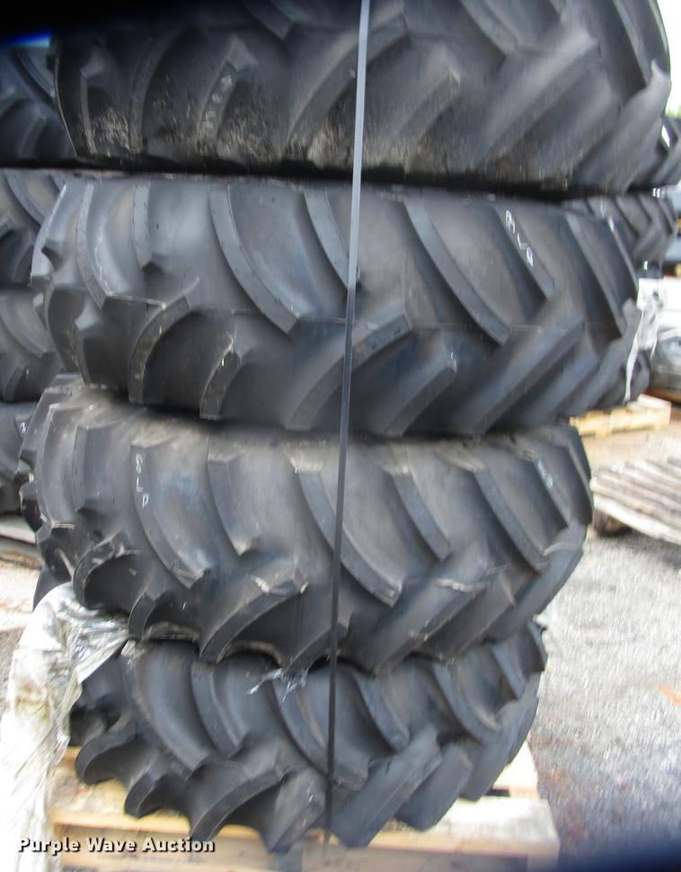 image for item G1632 (4) Titan 18.4-26 rear tire assemblies