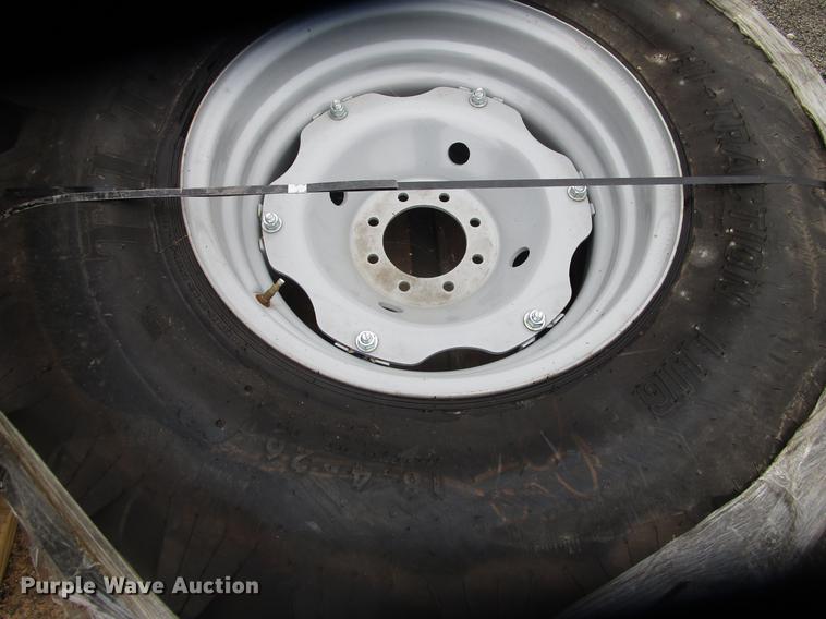 image for item G1632 (4) Titan 18.4-26 rear tire assemblies