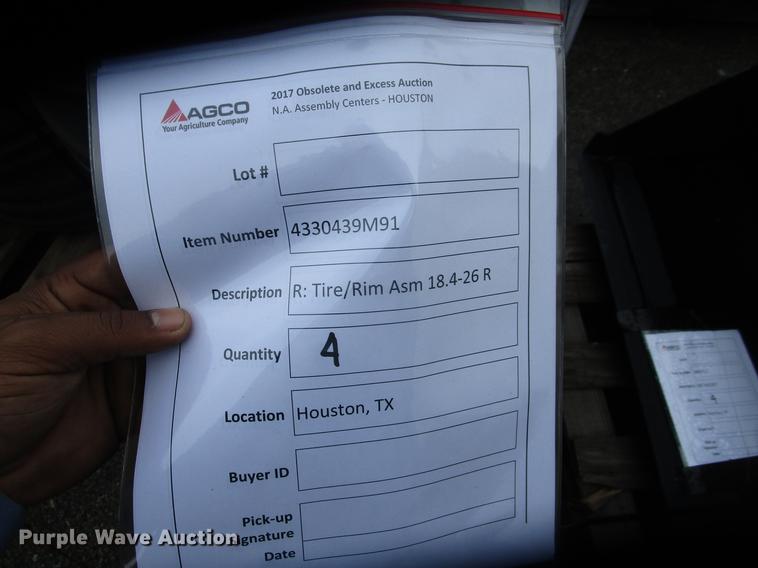 image for item G1800 (4) Titan 18.4-26 rear tire assemblies