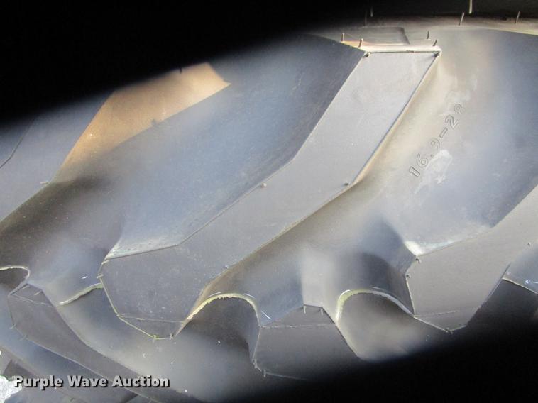 image for item G1962 (4) Goodyear 16.9x28 R1 rear tire assemblies