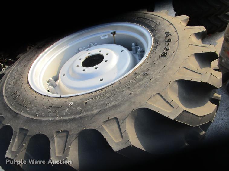 image for item G1966 (4) Goodyear 16.9x28 R1 rear tire assemblies